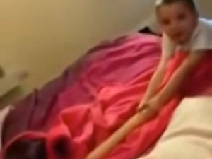 kid-playing-with-dildo